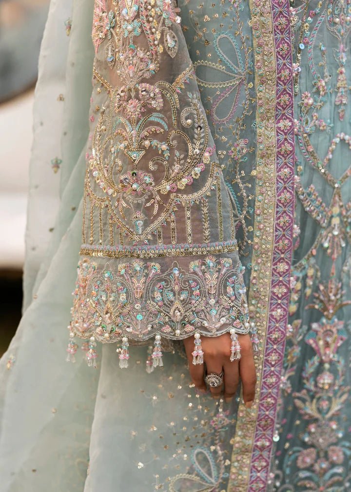 Model wearing Kanwal Malik Maahi Wedding Festive '24 AYZEL, a stunning pastel mint green ensemble with intricate embellishments, perfect for weddings. Available for Pakistani clothes online in the UK.