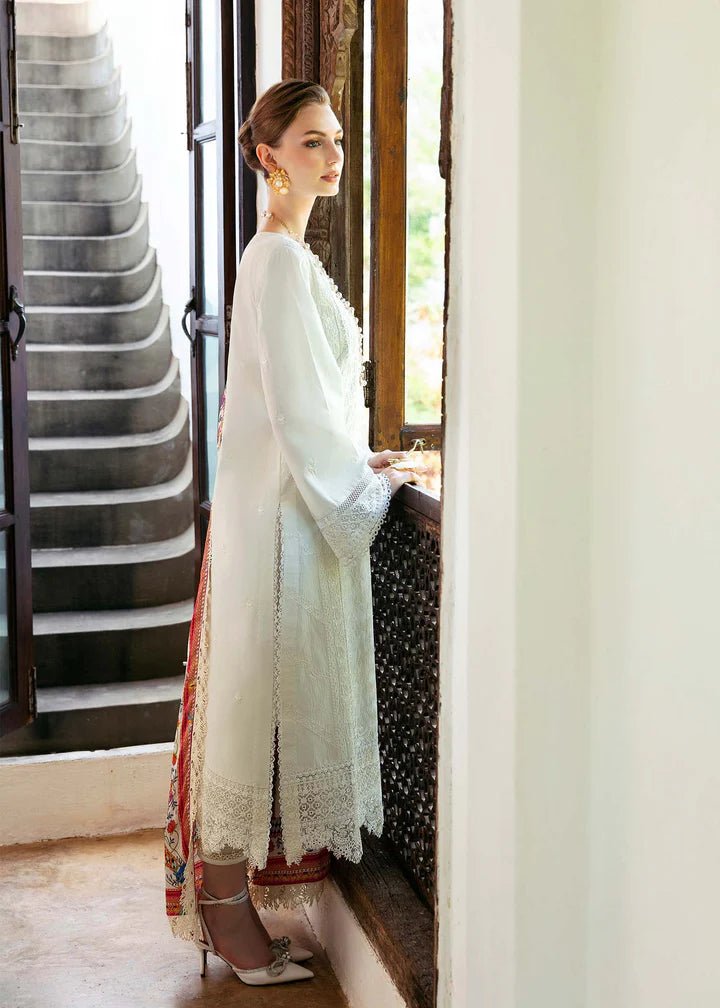 Model wearing a white Cerise dress from Kanwal Malik's Mayal Luxury Lawn collection, featuring vibrant multi - colored accents. Perfect for Pakistani clothes online in the UK.