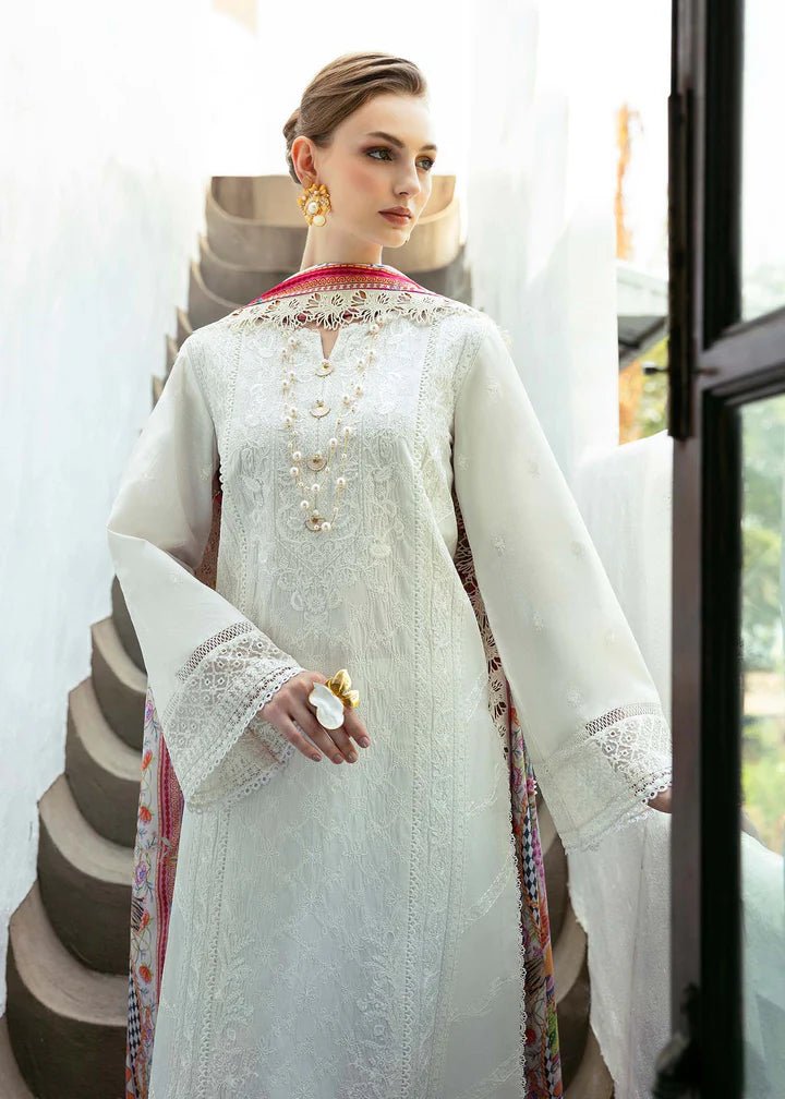 Model wearing a white Cerise dress from Kanwal Malik's Mayal Luxury Lawn collection, featuring vibrant multi - colored accents. Perfect for Pakistani clothes online in the UK.