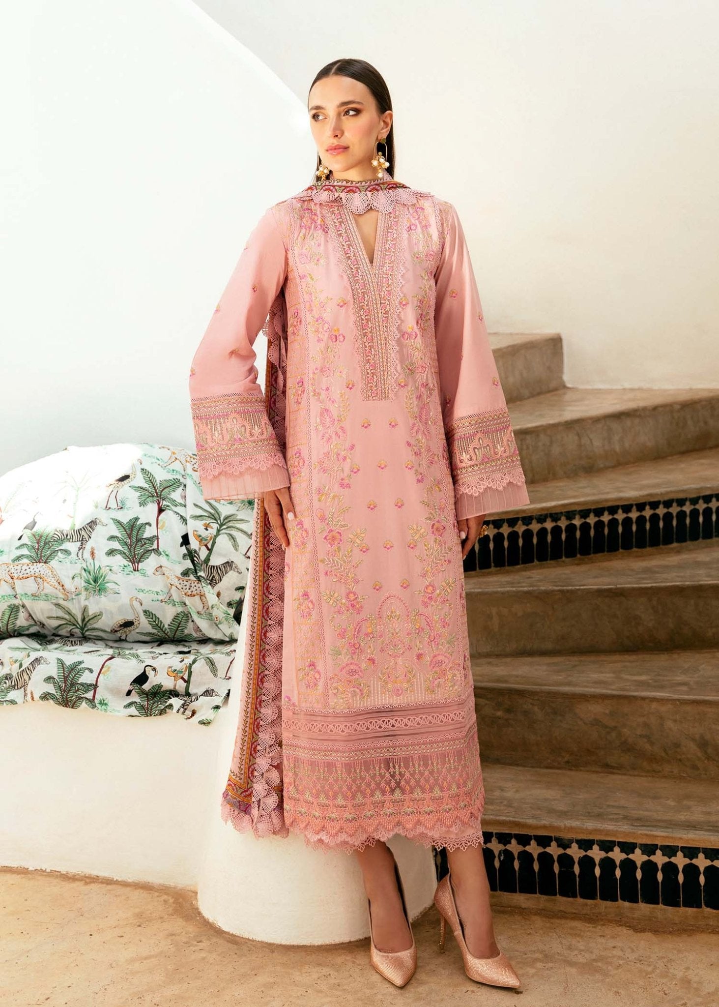 Model wearing Kanwal Malik Raham dress in soft pink, featuring delicate embroidery and lace, perfect for Pakistani lawn dresses and Eid clothes in the UK.