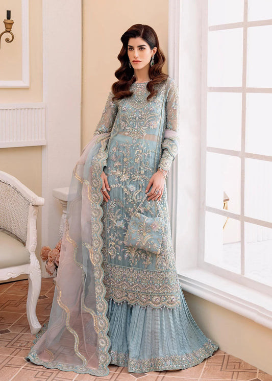 Model wearing Kanwal Malik MIRHA II '23 RIMEL dress, showcasing Pakistani wedding attire online in the UK.