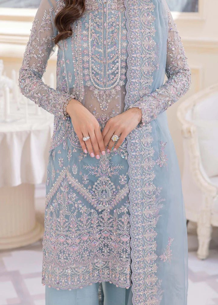 Model in Kanwal Malik MIRHA III Eid 24 Elsa dress in ice blue color, enriching Pakistani clothes online in the UK.