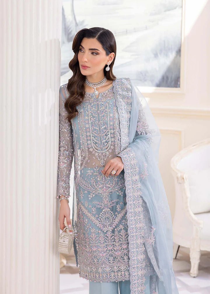 Model in Kanwal Malik MIRHA III Eid 24 Elsa dress in ice blue color, enriching Pakistani clothes online in the UK.