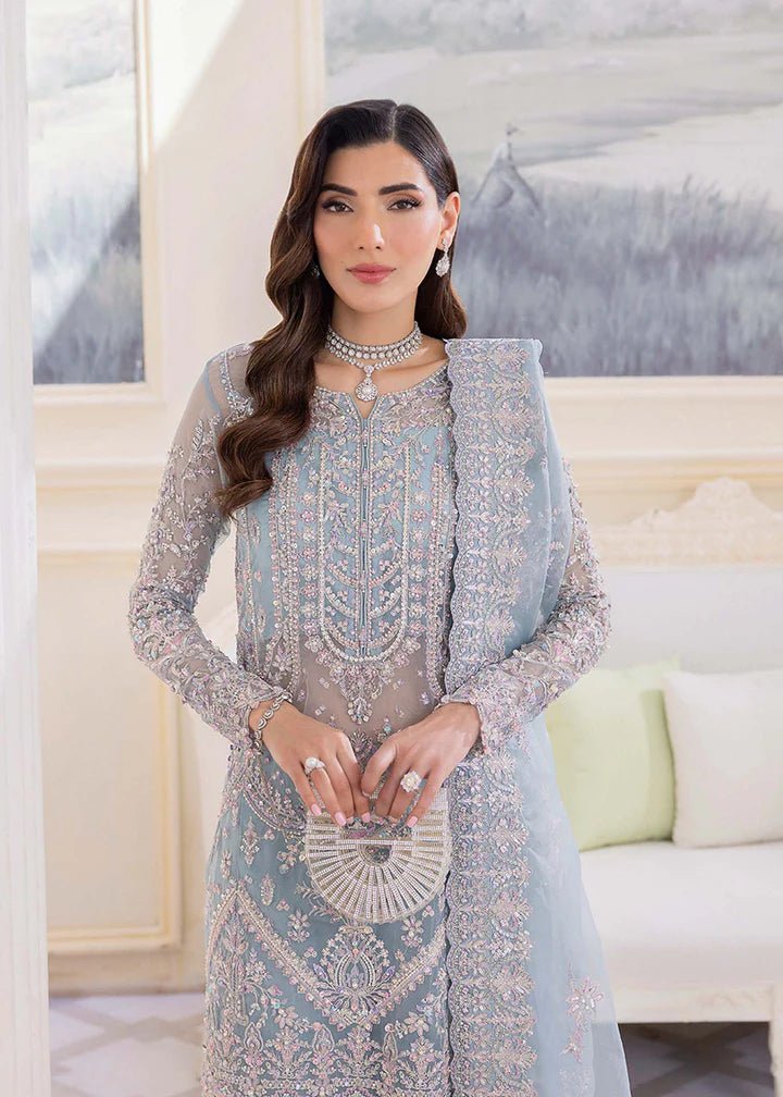 Model in Kanwal Malik MIRHA III Eid 24 Elsa dress in ice blue color, enriching Pakistani clothes online in the UK.