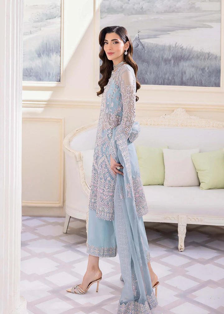 Model in Kanwal Malik MIRHA III Eid 24 Elsa dress in ice blue color, enriching Pakistani clothes online in the UK.