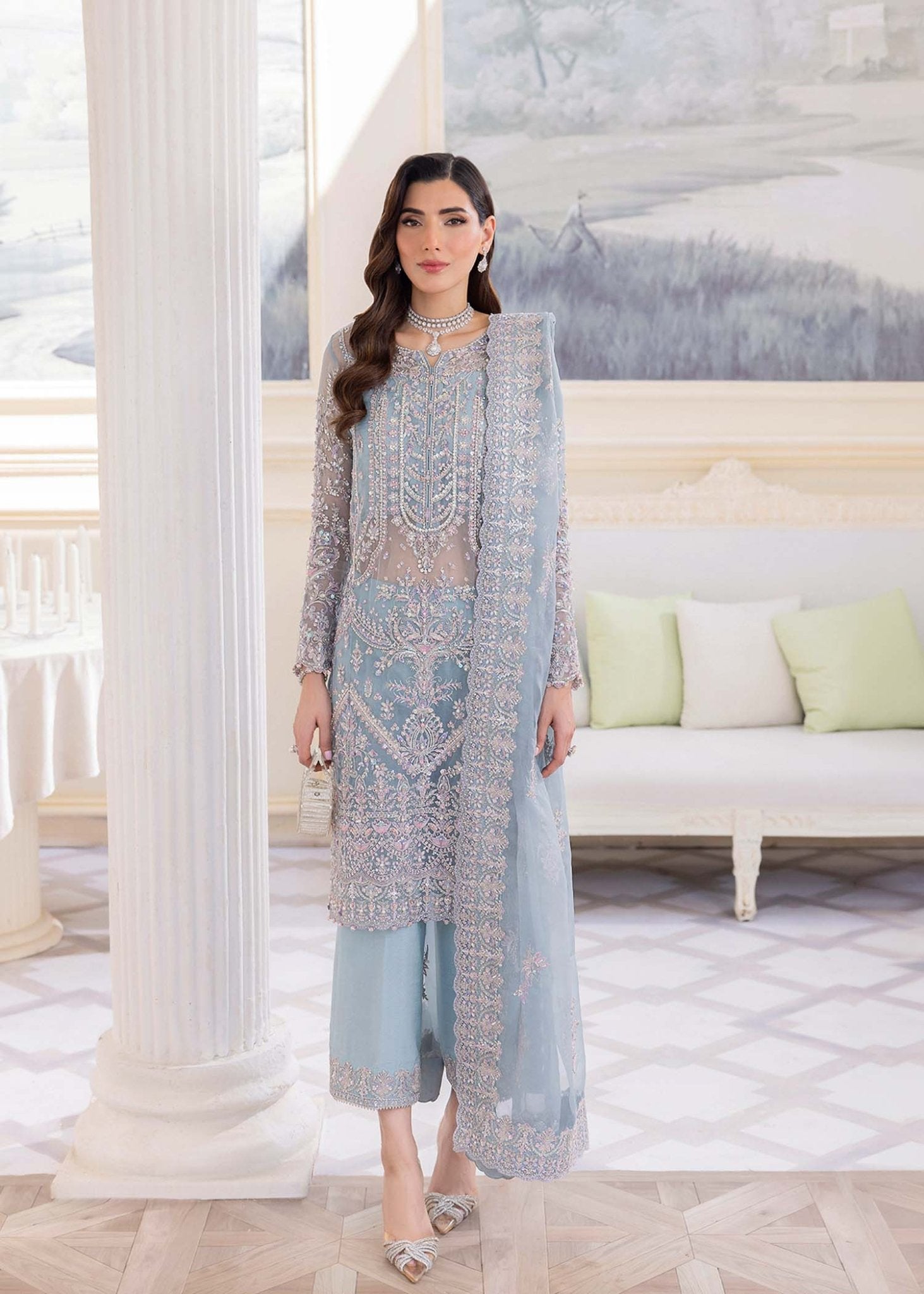 Model in Kanwal Malik MIRHA III Eid 24 Elsa dress in ice blue color, enriching Pakistani clothes online in the UK.