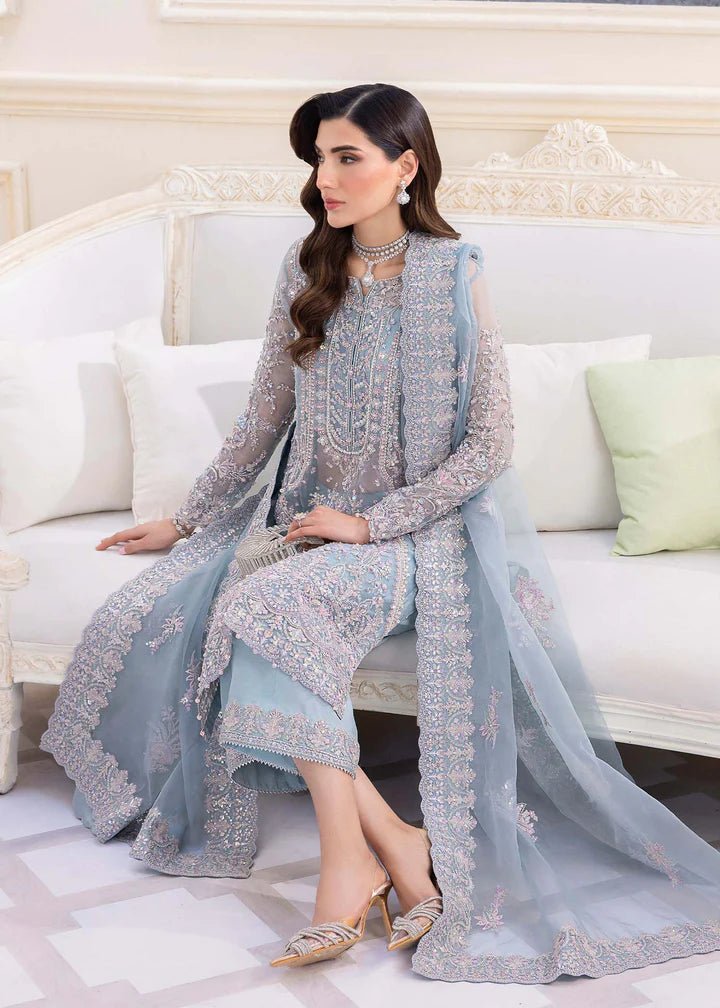 Model in Kanwal Malik MIRHA III Eid 24 Elsa dress in ice blue color, enriching Pakistani clothes online in the UK.