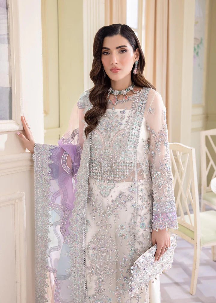 Model wearing Kanwal Malik MIRHA III Eid 24 Lumina dress in white, showcasing Pakistani wedding clothes online in the UK.