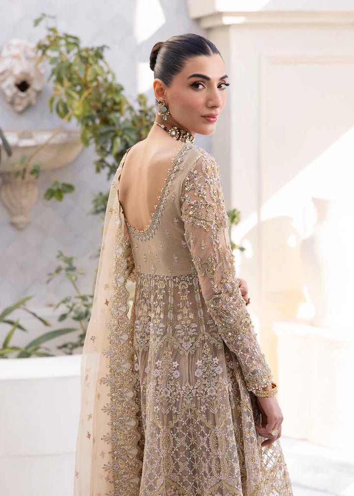 Model showcasing Kanwal Malik MIRHA III Eid 24 Nia dress, a nude pishwas elevating Pakistani clothes online in the UK.