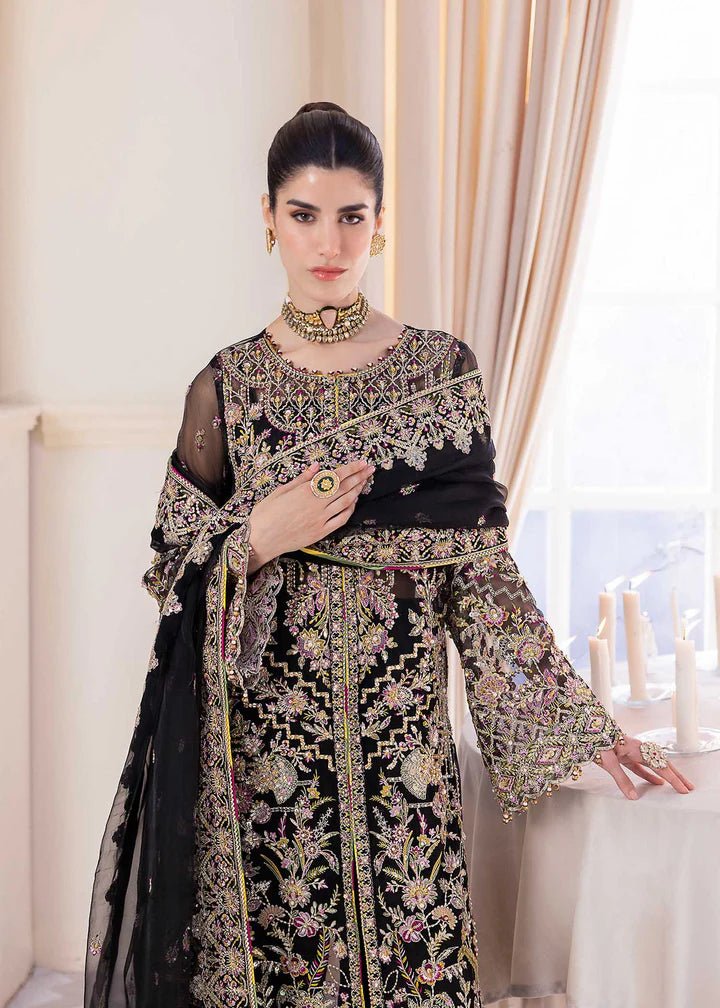 Model wearing Kanwal Malik MIRHA III Eid 24 Sable dress in black, showcasing Pakistani wedding clothes online in the UK.