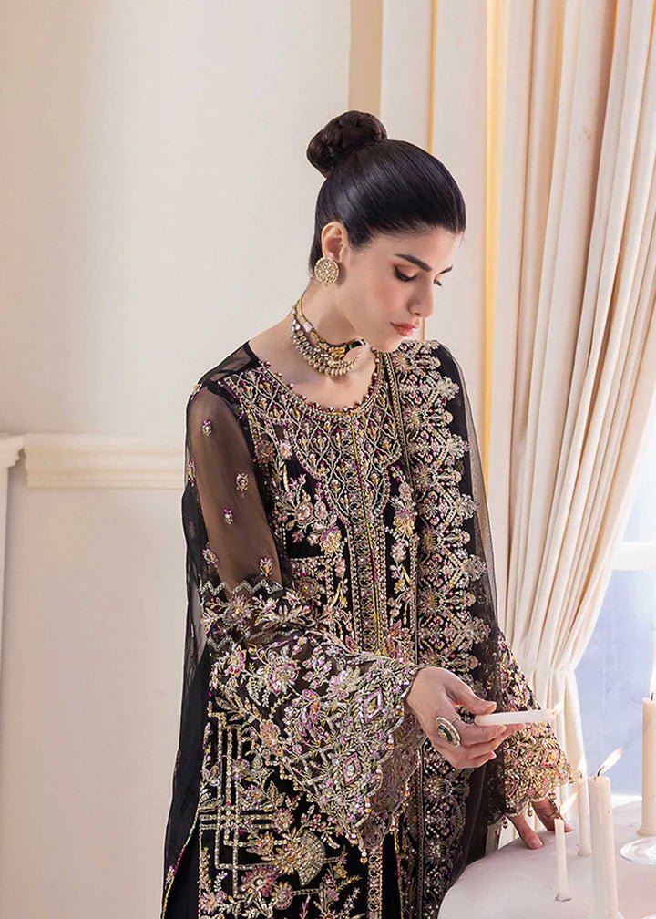 Model wearing Kanwal Malik MIRHA III Eid 24 Sable dress in black, showcasing Pakistani wedding clothes online in the UK.