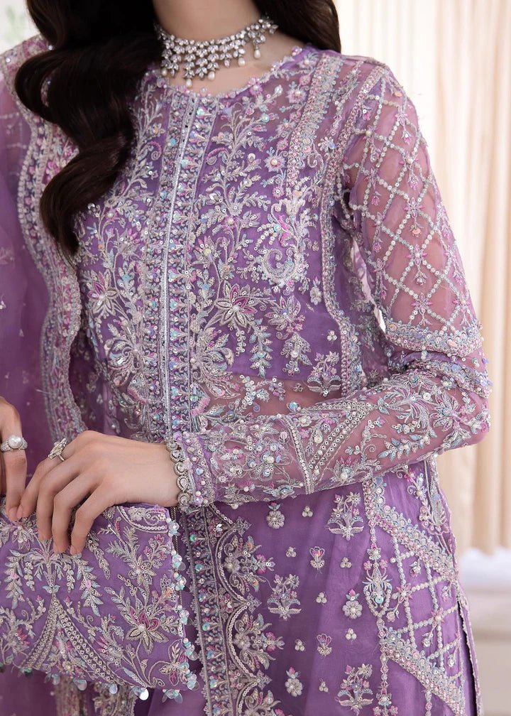 Model in Kanwal Malik MIRHA III Eid 24 Talia dress in lavender, enhancing Pakistani wedding clothes online in the UK.