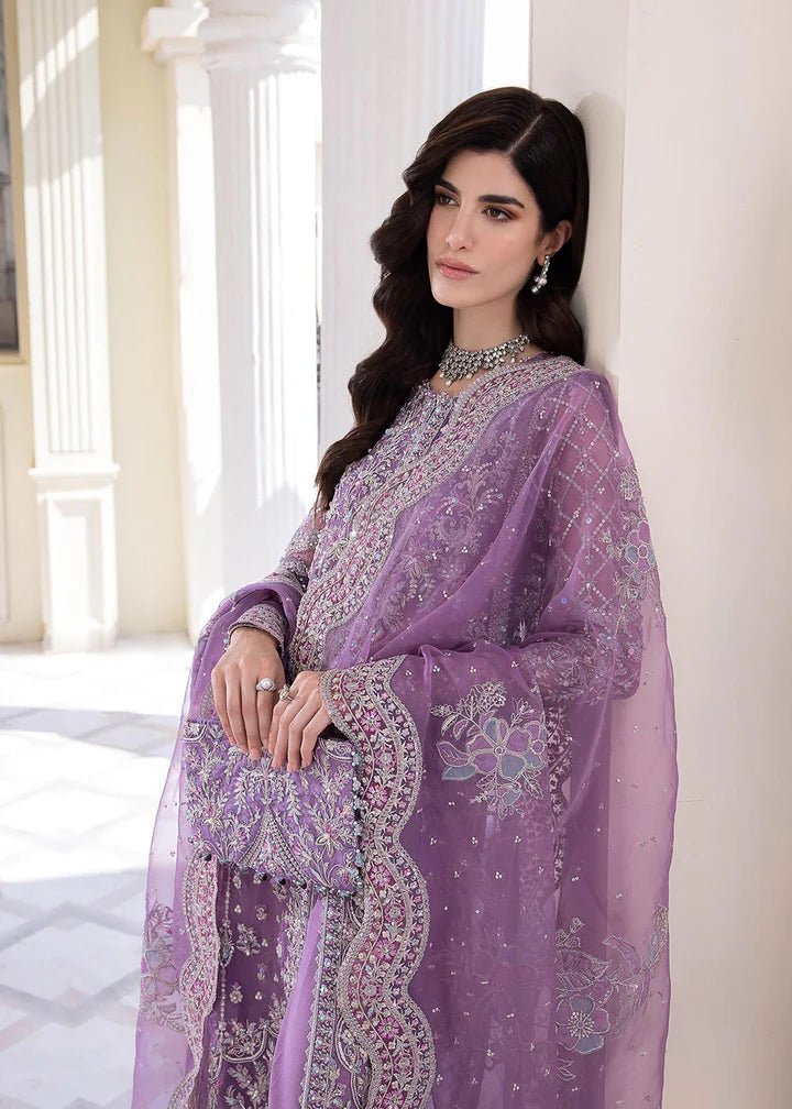 Model in Kanwal Malik MIRHA III Eid 24 Talia dress in lavender, enhancing Pakistani wedding clothes online in the UK.