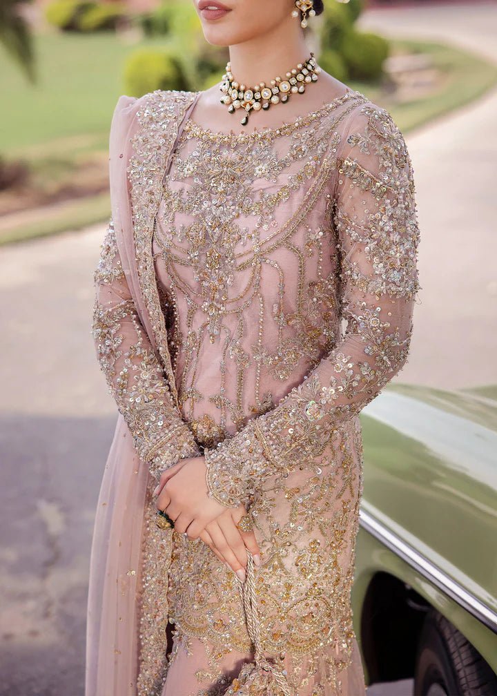 Model wearing Kanwal Malik Raaniyan Luxury Formals Aria dress in blush pink, Pakistani bridal clothes online in UK.