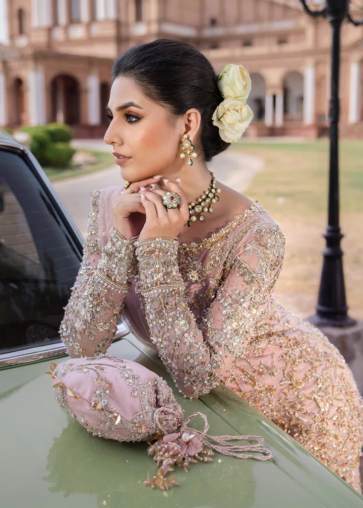 Model wearing Kanwal Malik Raaniyan Luxury Formals Aria dress in blush pink, Pakistani bridal clothes online in UK.