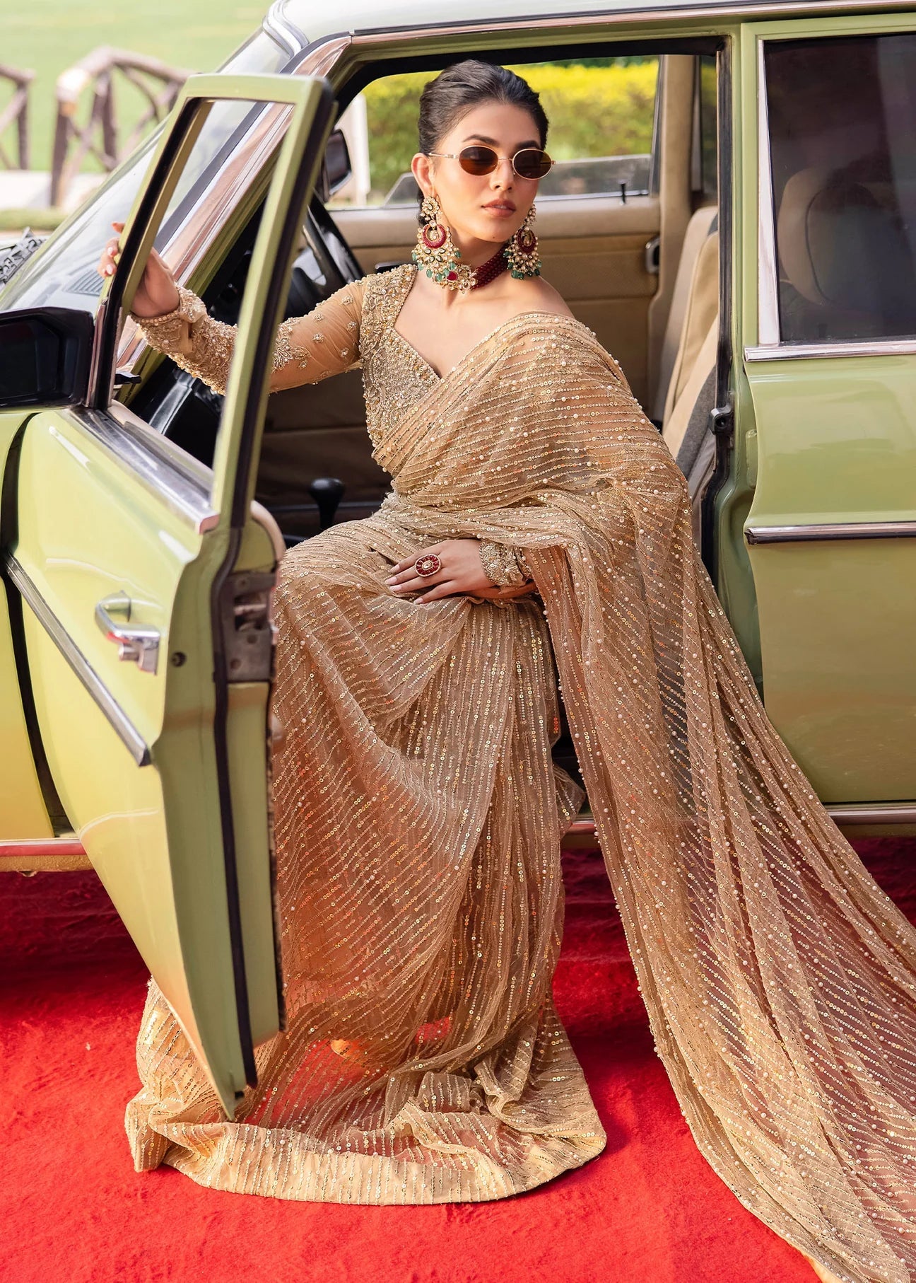 Model wearing Kanwal Malik Raaniyan Luxury Formals Mehrunisa dress in gold, Pakistani bridal clothes online in UK.