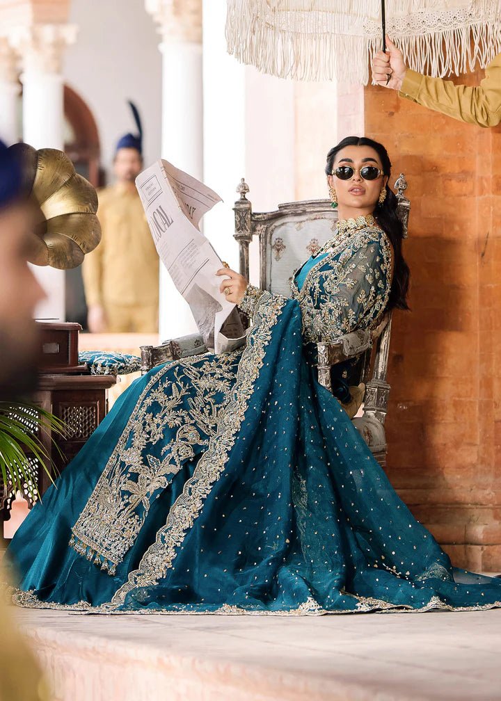 Model wearing Kanwal Malik Raaniyan Luxury Formals Rubab dress in teal, Pakistani bridal clothes online in UK.