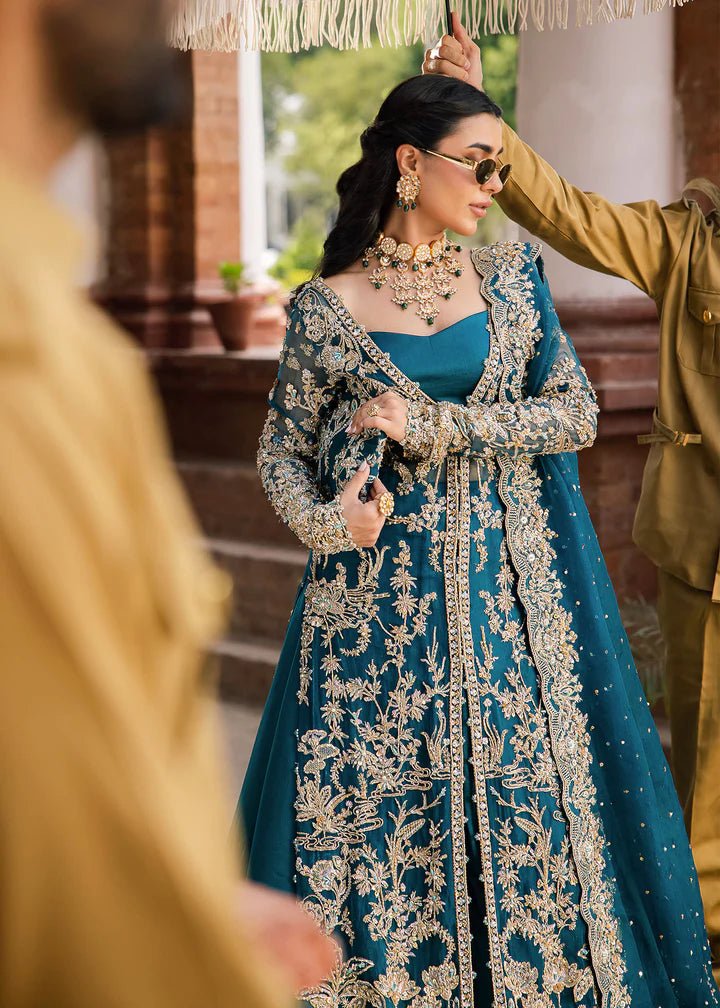 Model wearing Kanwal Malik Raaniyan Luxury Formals Rubab dress in teal, Pakistani bridal clothes online in UK.