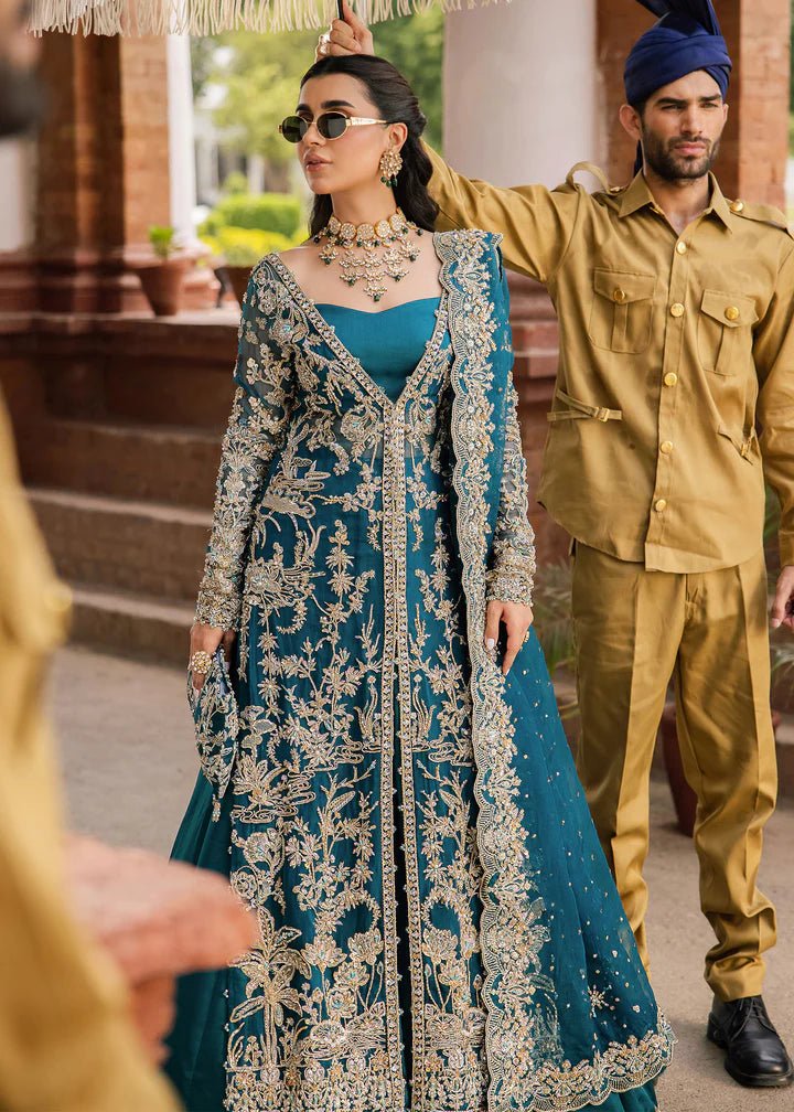 Model wearing Kanwal Malik Raaniyan Luxury Formals Rubab dress in teal, Pakistani bridal clothes online in UK.