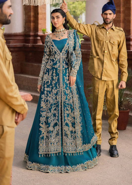 Model wearing Kanwal Malik Raaniyan Luxury Formals Rubab dress in teal, Pakistani bridal clothes online in UK.