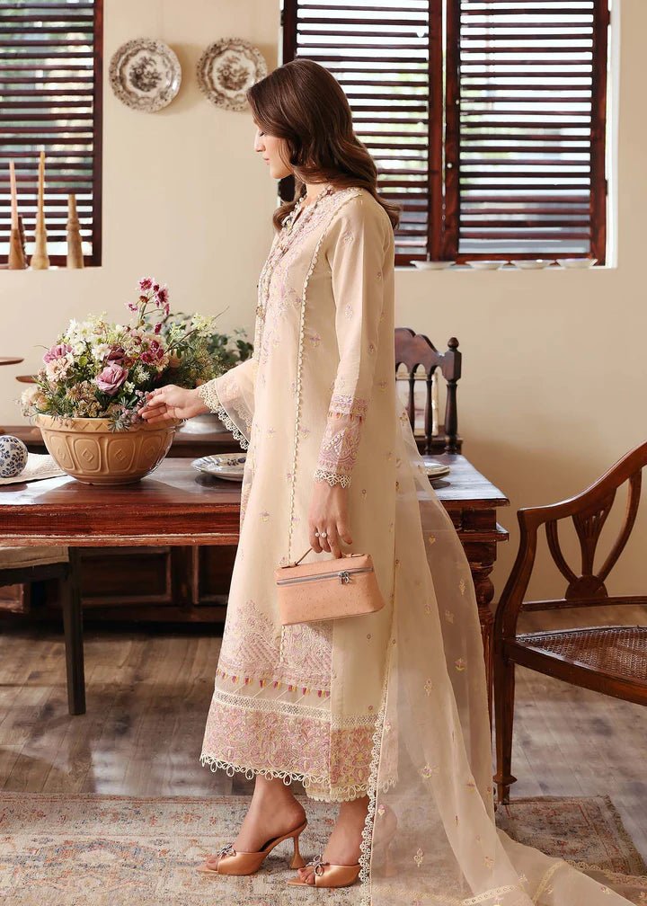 Model wearing Kanwal Malik Raha Casual Pret '24 Amelia dress in beige, showcasing Pakistani lawn suits online in the UK.