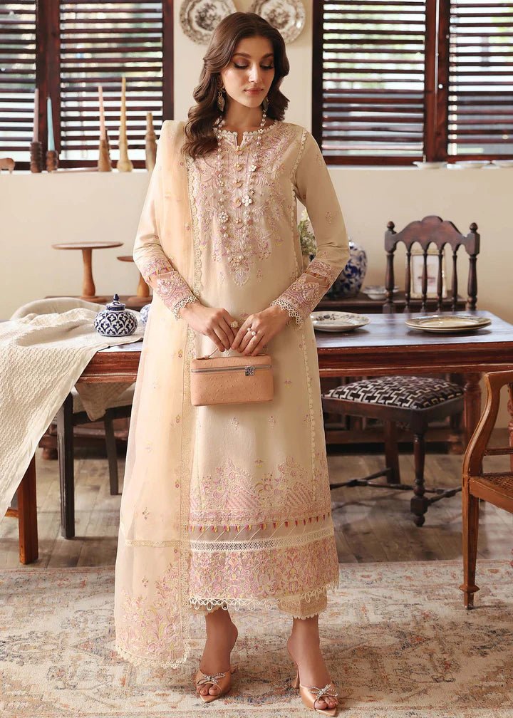 Model wearing Kanwal Malik Raha Casual Pret '24 Amelia dress in beige, showcasing Pakistani lawn suits online in the UK.