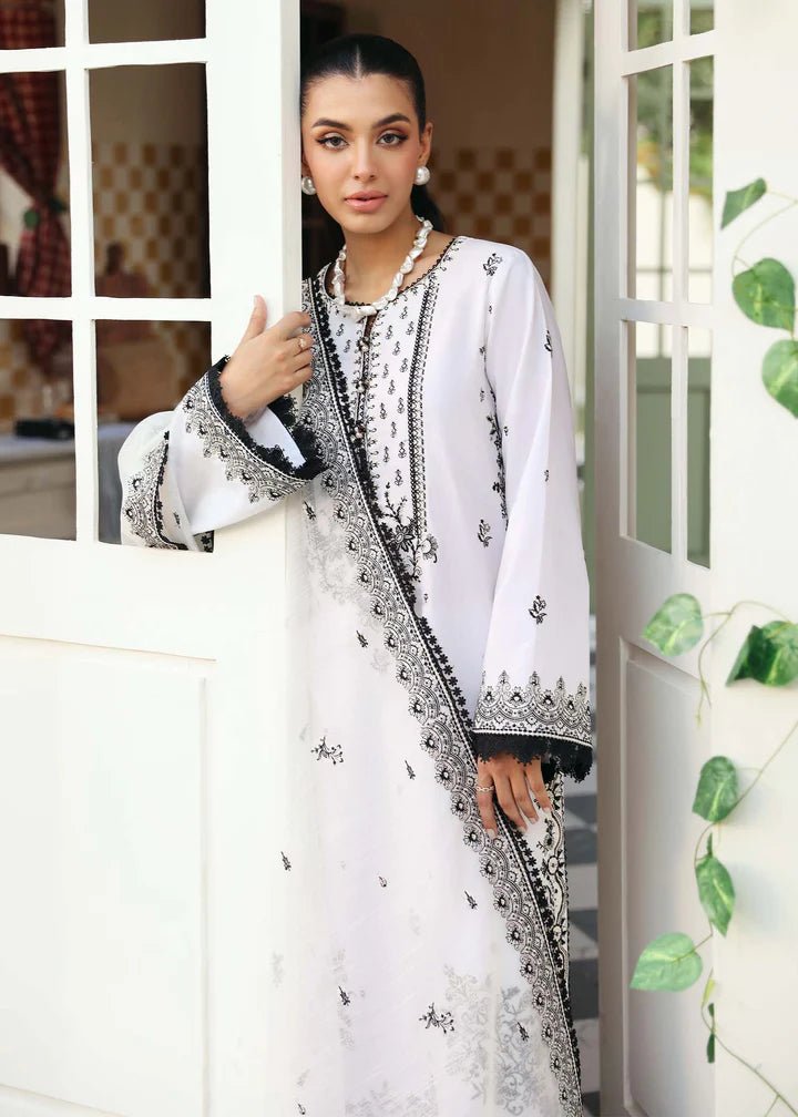 Model wearing Kanwal Malik Raha Casual Pret '24 Celine dress in white, showcasing Pakistani lawn suits online in the UK.