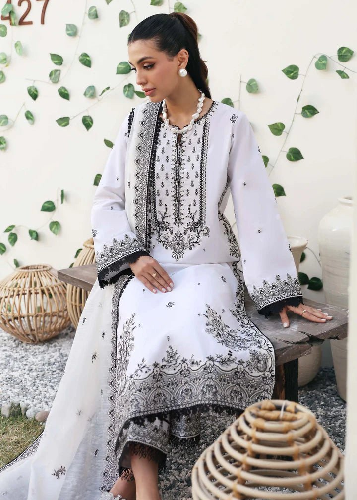 Model wearing Kanwal Malik Raha Casual Pret '24 Celine dress in white, showcasing Pakistani lawn suits online in the UK.