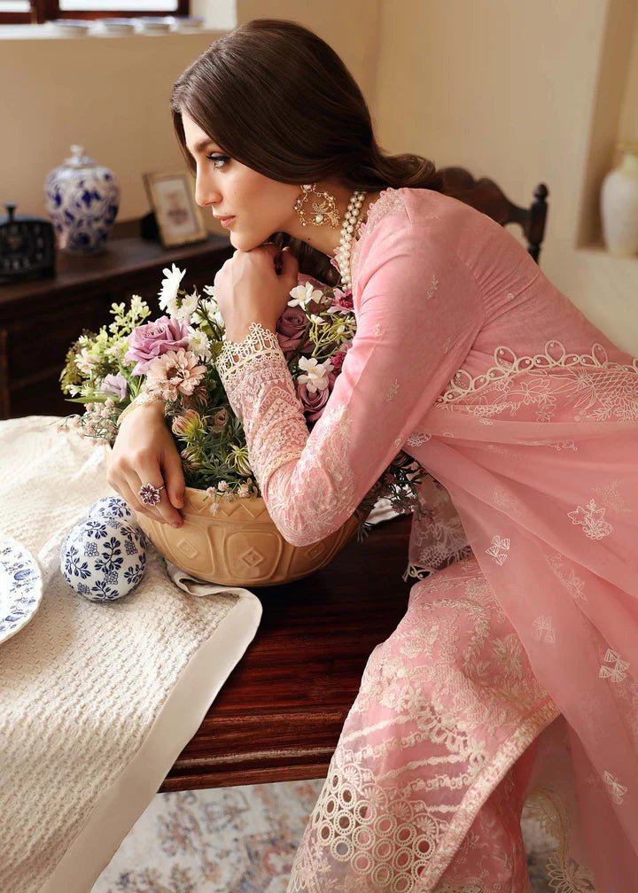 Model wearing Kanwal Malik Raha Casual Pret '24 Geneva dress in pink, showcasing Pakistani lawn suits online in the UK.