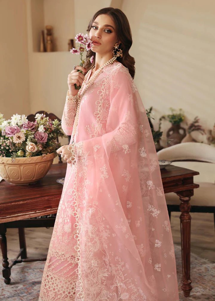 Model wearing Kanwal Malik Raha Casual Pret '24 Geneva dress in pink, showcasing Pakistani lawn suits online in the UK.