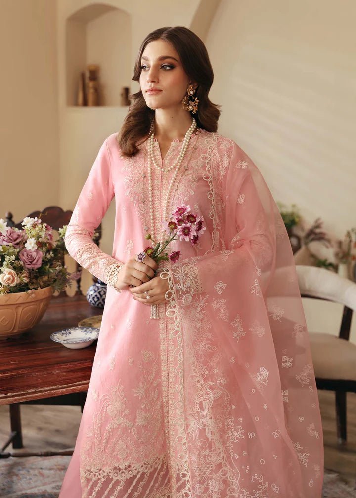 Model wearing Kanwal Malik Raha Casual Pret '24 Geneva dress in pink, showcasing Pakistani lawn suits online in the UK.