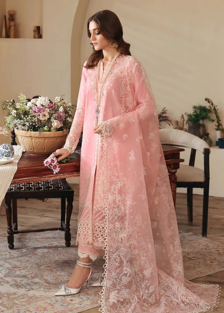 Model wearing Kanwal Malik Raha Casual Pret '24 Geneva dress in pink, showcasing Pakistani lawn suits online in the UK.