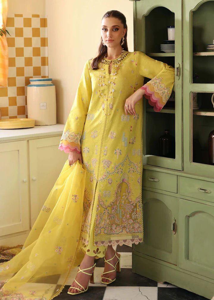 Model wearing Kanwal Malik Raha Casual Pret '24 Lucia dress in yellow, showcasing Pakistani lawn suits online in the UK.