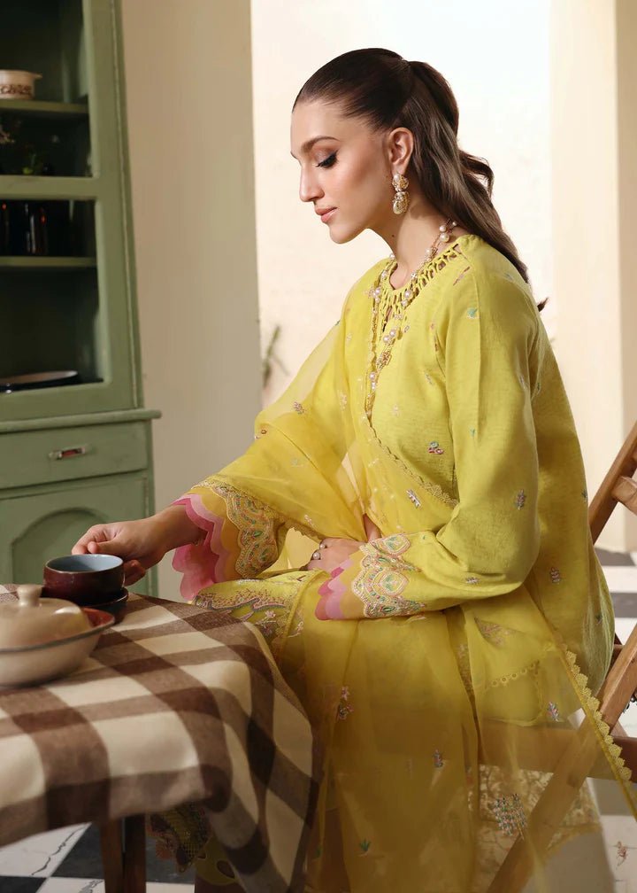 Model wearing Kanwal Malik Raha Casual Pret '24 Lucia dress in yellow, showcasing Pakistani lawn suits online in the UK.