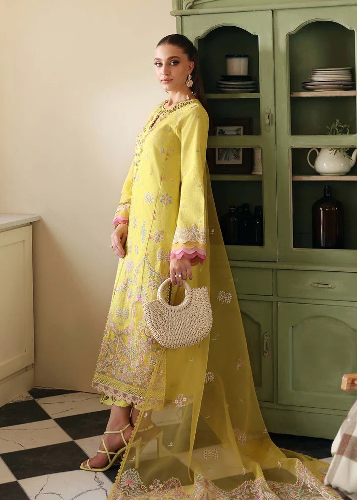 Model wearing Kanwal Malik Raha Casual Pret '24 Lucia dress in yellow, showcasing Pakistani lawn suits online in the UK.