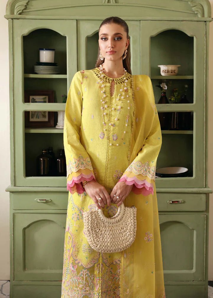 Model wearing Kanwal Malik Raha Casual Pret '24 Lucia dress in yellow, showcasing Pakistani lawn suits online in the UK.