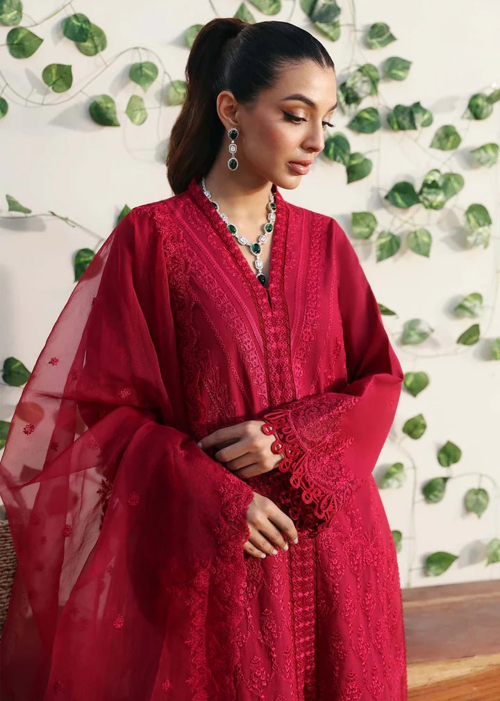 Model wearing Kanwal Malik Raha Casual Pret '24 Paula dress in deep red, showcasing Pakistani lawn suits online in the UK.