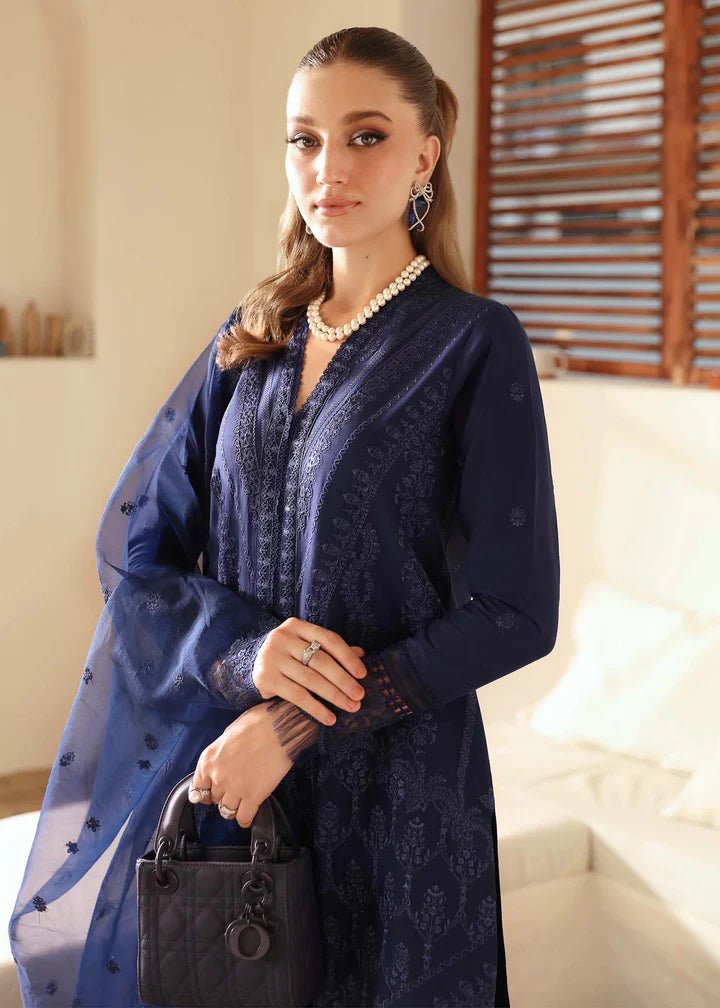 Model wearing Kanwal Malik Raha Casual Pret '24 Rachael dress in navy blue, showcasing Pakistani lawn suits online in the UK.