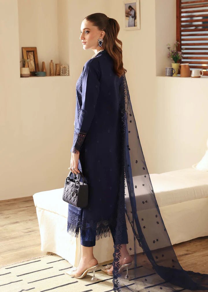 Model wearing Kanwal Malik Raha Casual Pret '24 Rachael dress in navy blue, showcasing Pakistani lawn suits online in the UK.