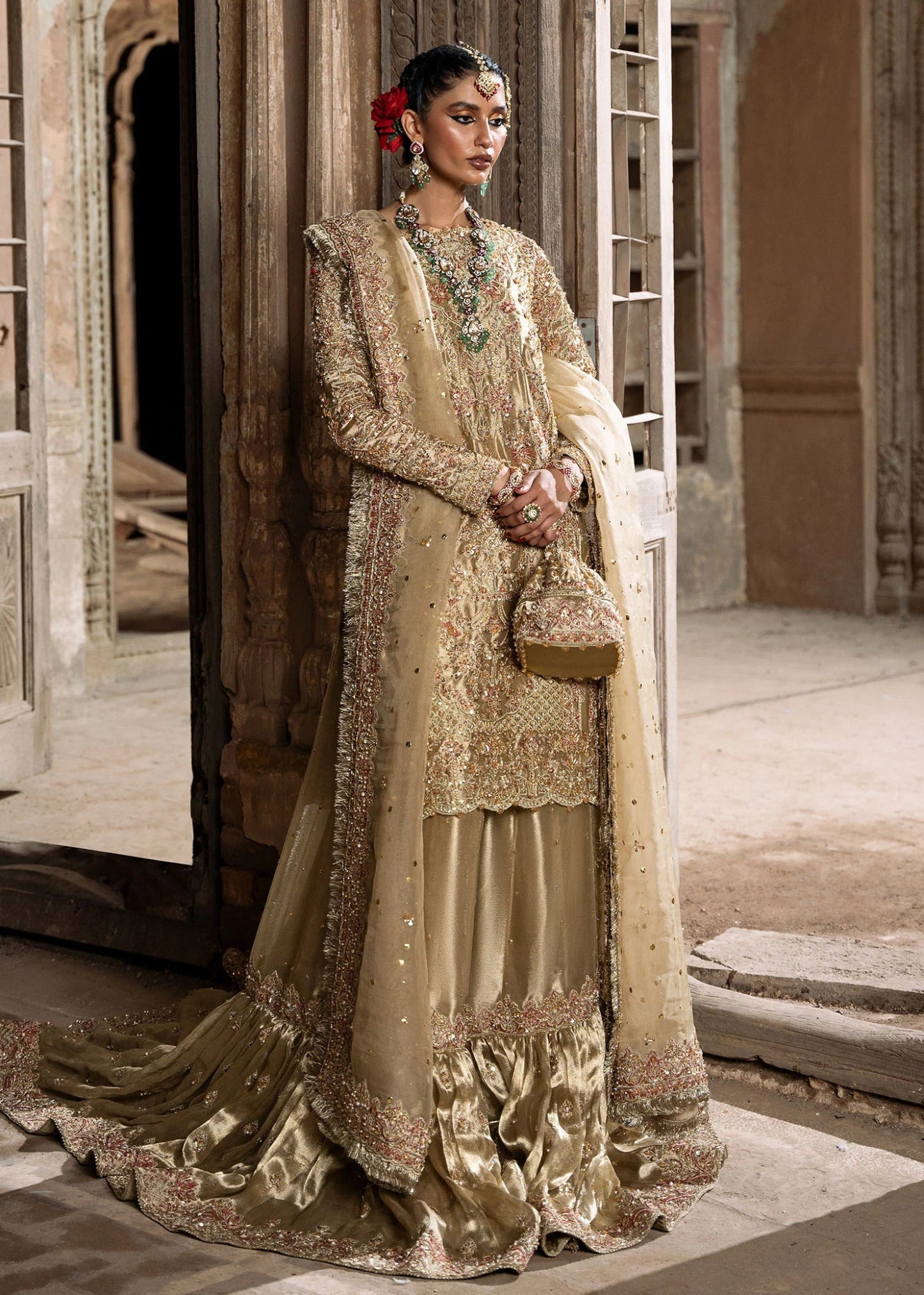 Explore Kanwal Malik's Shahnoor from the Sajni II Formal Collection, a luxurious gold ensemble featuring intricate pearl and sequin embellishments. Priced at £824. Shop Pakistani wedding clothes online in the UK at Signature Labels today!