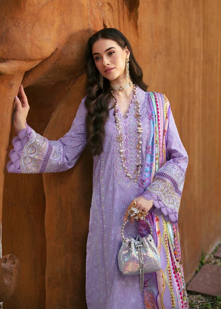 Model showcases Kanwal Malik's Capri dress, a Lilac Pakistani luxury lawn piece, ideal for UK style.