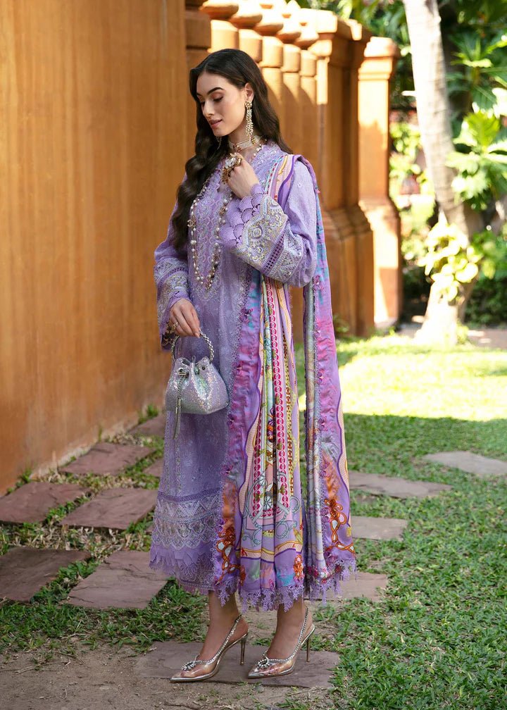 Model showcases Kanwal Malik's Capri dress, a Lilac Pakistani luxury lawn piece, ideal for UK style.