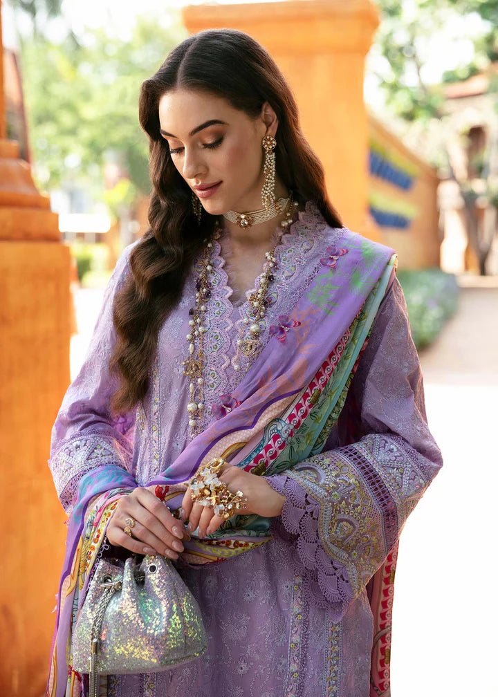 Model showcases Kanwal Malik's Capri dress, a Lilac Pakistani luxury lawn piece, ideal for UK style.