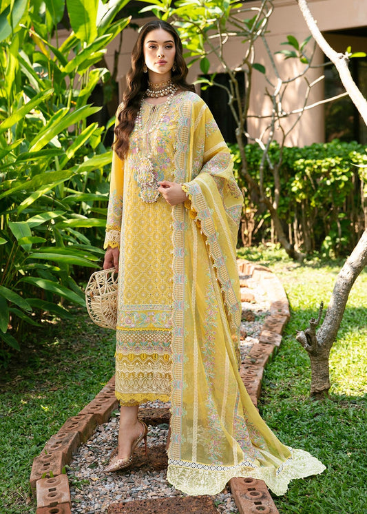 Model in Kanwal Malik's Vanessa dress, showcasing exquisite Pakistani lawn fabric, ideal for UK fashion.