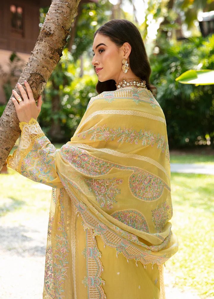 Model flaunting Kanwal Malik Sareen Luxury Lawn’24 Vanessa dress, a chic addition to Pakistani clothes online in the UK.