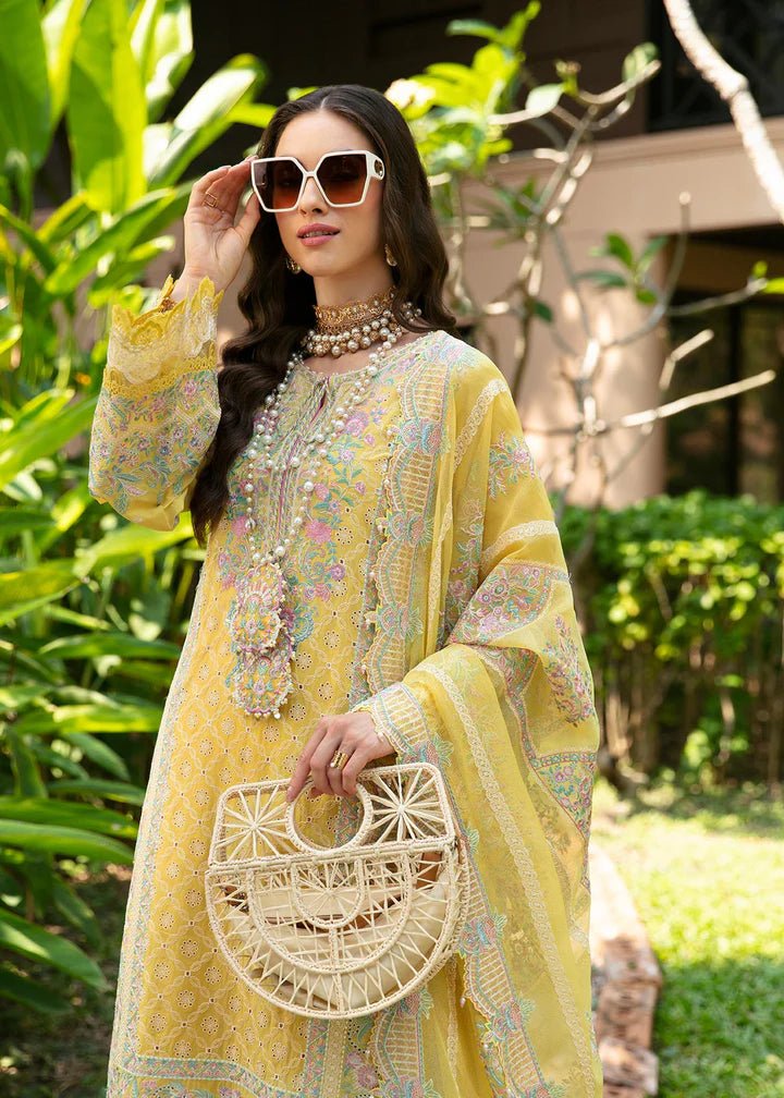 Model flaunting Kanwal Malik Sareen Luxury Lawn’24 Vanessa dress, a chic addition to Pakistani clothes online in the UK.