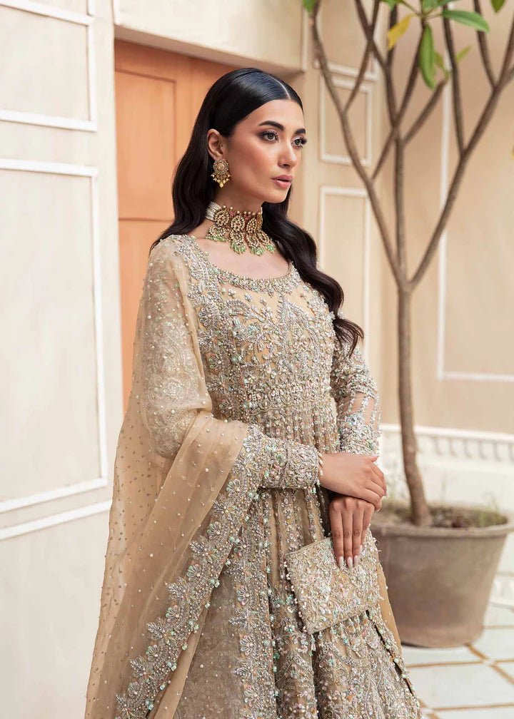 Model flaunting Kanwal Malik Vistas Of Jaipur '23 Barsha dress, a vibrant addition to Pakistani wedding clothes online in the UK.