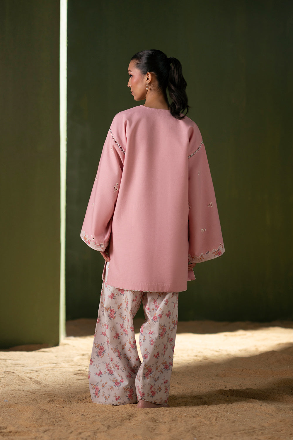 Model wearing pastel pink embroidered outfit from Saira Rizwan Joolie | JOOLIE PINK - JBP25-08, Pakistani luxury pret available online in UK.