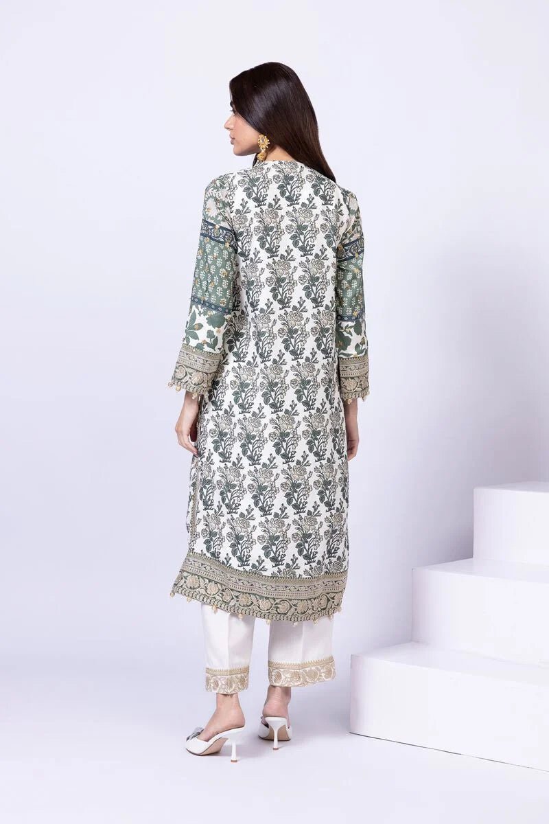 Model wearing Khaadi EST24563B off - white dress with intricate green prints and embroidered dupatta. Shop Pakistani clothes online in the UK now.