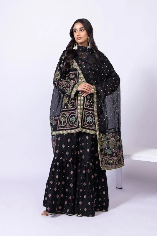 Model wearing Khaadi EST24608A black dress with intricate multicolor embroidery and gharara. Shop Pakistani clothes online in the UK now.